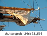 2013 November 10, San Diego, CA. Tall ship three mast bark Star of India sailing off San Diego 150th year anniversary. Crew in yards setting sails. Pacific Ocean