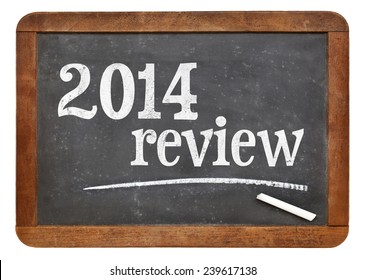 2014 review - year summary concept on a vintage slate blackboard