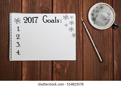 2017 goals inscription paper blank album with on table pen coffee - Powered by Shutterstock