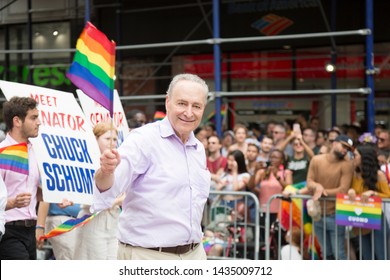 2018 JUNE 24 NEW YORK: Democratic Senate Minority Leader Chuck Schumer And Supporters March Along The 5th Ave Parade Route During The NYC Pride March.