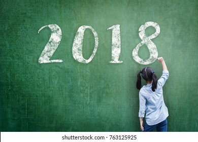 2018 New Calendar Year Greeting By Kid's Hand Drawing On School Teacher's Chalkboard For Student's Educational New Academic Year, Education Semester, Class Schedule Concept 