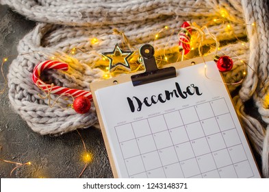 2018 Year End Review, Date Planning, Appointment, Deadline Or Holiday Concept On Wooden Table Next To Black Clean Calendar On Month Of December.