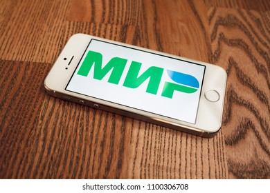 2018.04.23 Kazan Russia - Russian MIR Payment System Logo On Apple Iphone 5 SE Screen.