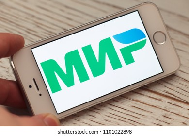 2018.04.23 Kazan Russia - Russian MIR Payment System Logo On Apple Iphone 5 SE Screen.