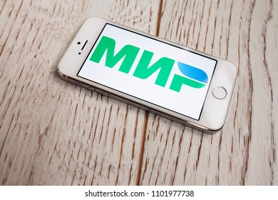 2018.04.23 Kazan Russia - Russian MIR Payment System Logo On Apple Iphone 5 SE Screen.