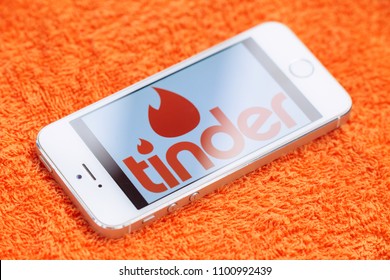 2018.04.23 Kazan Russia - Tinder dating app on Apple iphone 5 SE screen