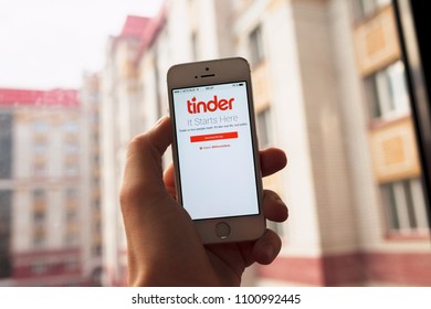 2018.04.23 Kazan Russia - Tinder dating app on Apple iphone 5 SE screen - Shutterstock ID 1100992445