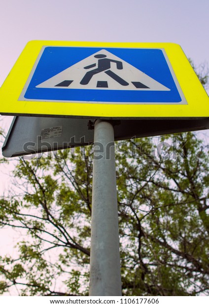 2018.05.09, Moscow, Russia. road sign of pedestrian\
crossing close up.