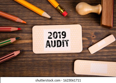 2019 Audit and Review. Reports, documents, business and goals concept. Note sheet like medical plaster - Powered by Shutterstock