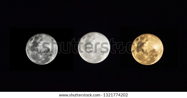2019 February Full moon\
on the dark south asian sky.Yellow Moon. Red Moon.Moon with cloudy\
night sky.