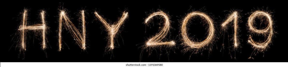 2019 Happy New Year Sparkler Light Drawn In Letters At Night Time To Celebrate Special Holiday Occasion, Christmas Party, Diwali, Independent Day Or Important Event