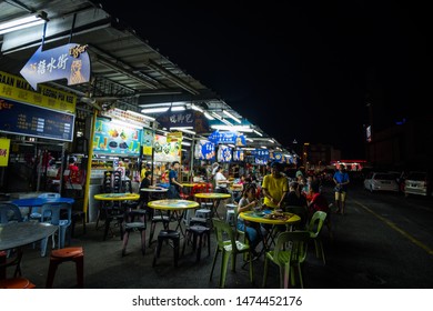 2019 May 9th, Malaysia, Perak, Ipoh, Local People Are Having Dinner In The Local Food Stalls At Tong Sui Kai Night Market.