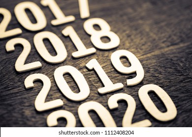 2019 in running year numbers on wood background