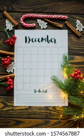 2019 Year End Review, Date Planning, Appointment, Deadline Or Holiday Concept On Wooden Table Next To Black Clean Calendar On Month Of December.