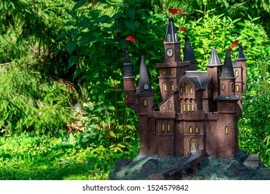 2019-09-08 Vologda, Russia. Fairytale Toy Castle In The Garden. Toy Garden Castle. Concept: Entertainment For Children, Garden Sculptures.