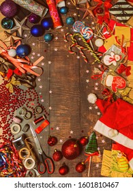 2019.12.28, Moscow, Russia. Work Area On The Table For The Preparation Of Gifts For The New Year's Eve. Work Mess Chaos On Christmas Eve. Concept Of Holidays.