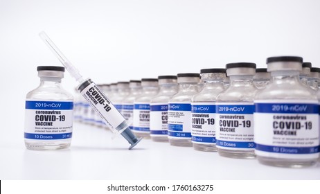 2019-ncov Covid-19 Corona Virus Drug Vaccine Vials Medicine Bottles Syringe Injection. SARS-CoV-2 Vaccination, Immunization, Treatment To Cure Covid 19 Corona Virus Infection. Medical Concept.