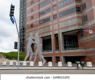 2020 April 4 Los Angeles California USA: Sculpture in front of the Edward R. Roybal Federal building stands in stark contrast to social distancing during Coronavirus COVID-19 pandemic, stay at home