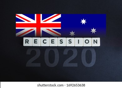 2020 Australia Recession And Economic Crisis Due To Coronavirus Or Covid-19. Australian Flag On Black Background.