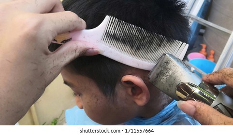  2020 At Ayutthaya., A Picture Of A Man Was Cutting His Hair At Home Because The Barber Shop Was Closed For Service Due To The Effects Of The Covid -19 Virus Epidemic.