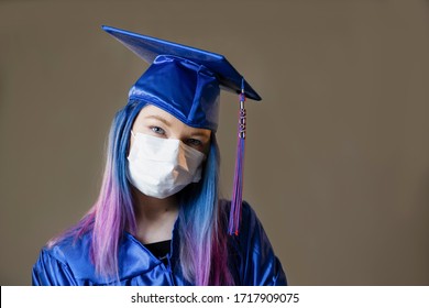 2020 Graduation Student In Blue Cap And Gown 