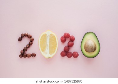 2020 Made From Healthy Food On Pink Background, Happy New Year, Health Diet Resolution, Goals And Lifestyle