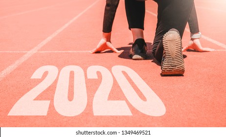 2020 Newyear , Athlete Woman Starting On Line For Start Running With Number 2020 Start To New Year.