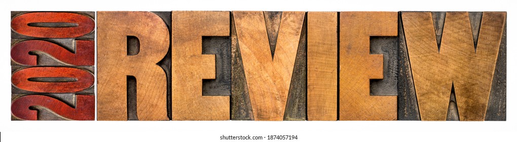 2020 review banner - annual review or summary of the recent year - isolated word abstract in letterpress wood type blocks, business concept