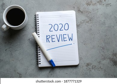 2020 Review; Last Year Review In Life; Flat Lay Business Concept. Writing And Preparing For New Year 2021 Resolutions