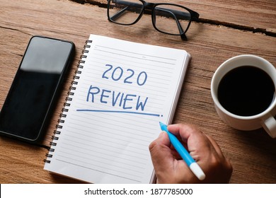 2020 Review; Last Year Review In Life; Flat Lay Business Concept. Writing And Preparing For New Year 2021 Resolutions