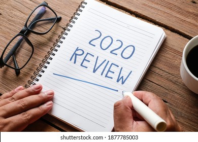 2020 Review; Last Year Review In Life; Flat Lay Business Concept. Writing And Preparing For New Year 2021 Resolutions