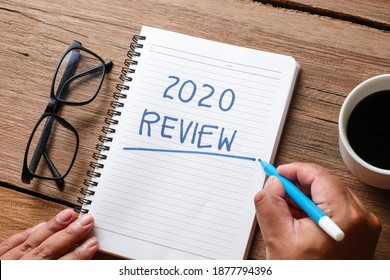 2020 Review; Last Year Review In Life; Flat Lay Business Concept. Writing And Preparing For New Year 2021 Resolutions