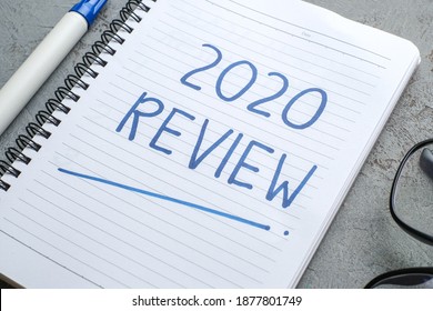 2020 Review; Last Year Review In Life; Flat Lay Business Concept. Writing And Preparing For New Year 2021 Resolutions