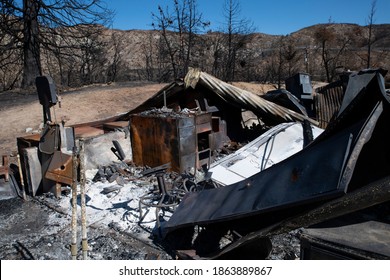 2020: USA “Lake Fire” Wildfire Near Lake Hughes, California Destroyed Homes And Out Buildings. Pine Canyon Road. Climate Change. Residential Buildings Fire Burnt Landscape 