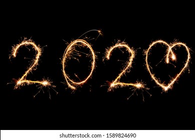 2020 written with Sparkle firework on black background, happy new year 2020 concept. - Shutterstock ID 1589824690