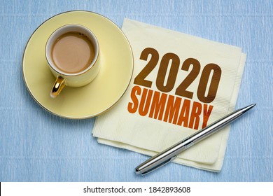 2020 year summary text on a napkin with a cup of coffee, end of year business concept