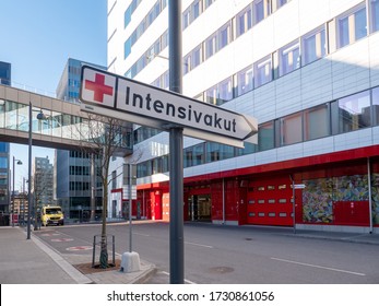 2020-04-19: Sign Outside Karolinska University Hospital In Solna, Stockholm Spelling The Swedish Word Intensivakut Translating Into Emergency Care Unit