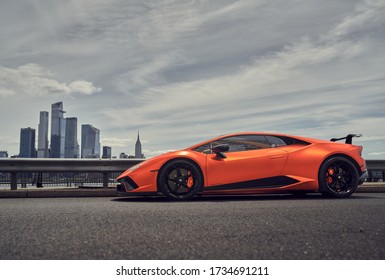 2020.10.15 Hoboken, New Jersey A Orange Lamborghini Huracan Performante on the street with the New York Skyline in the back. 