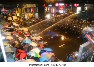 2020,October,16,Bangkok,Thailand, Thousands of democracy protesters seized Pathumwan Intersection.The police used crowd control and high-pressure water tanks force to seize back from protesters.