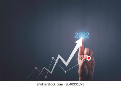 2021 business finance technology and investment concept. Stock Market Investments Funds and Digital Assets. Businessman plan and increase of positive indicators in his business, Growing up business.