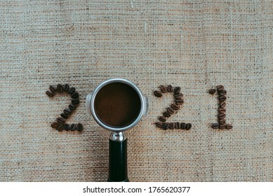 
2021 Coffee Beans On Sack Texture Background, New Year Concept