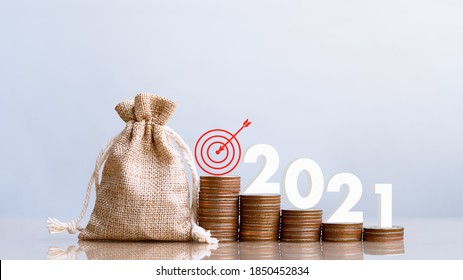 2021 and Coins stack. Pension fund, 401K, Passive income. Investment and retirement. Business investment growth concept. Risk management. Budget 2021. - Shutterstock ID 1850452834