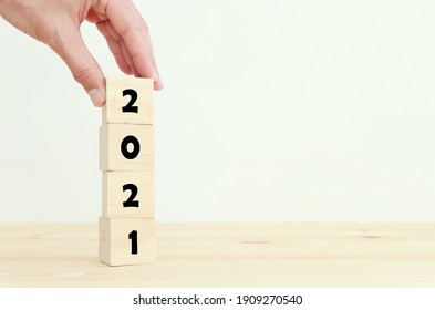 2021 concept. cubes on wooden table - Shutterstock ID 1909270540