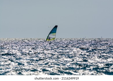 2021. Extreem water sports - wing foil, kite surfing, wind surfindg, windy day on Almanarre beach near Toulon, South of France