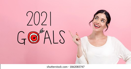 2021 Goals Concept With Happy Young Woman Pointing