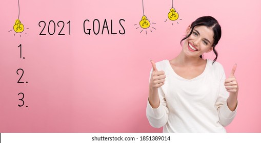 2021 Goals With Happy Young Woman Giving Thumbs Up