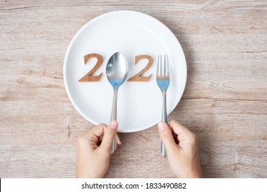 2021 Happy New Year And New You With White Plate On Wood Background. Goals, Healthy, Healthcare, Resolution, Time To New Start, Sport, Fitness And Dieting Concept