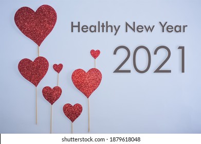 2021 Healthy New Year Letter With Love Sticks On White Background. New Year Celebration Concept 