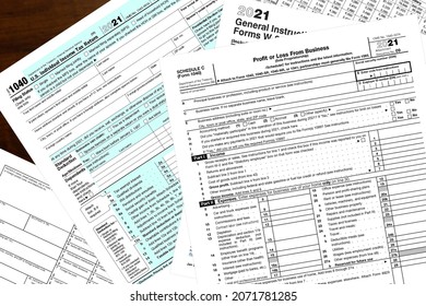 2021 IRS Tax Forms On A Desktop.