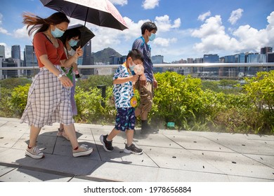 2021 May 23,Hong Kong.Citizens Wear Masks And Walk In The Park In Hot Weather .